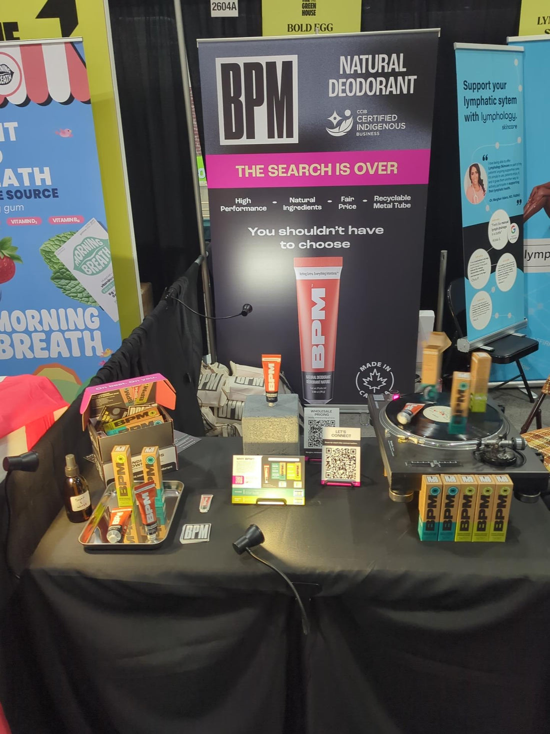 BPM natural deodorant booth at CHFA Now Toronto 2026 with Certified Indigenous Business banner and turntable product display