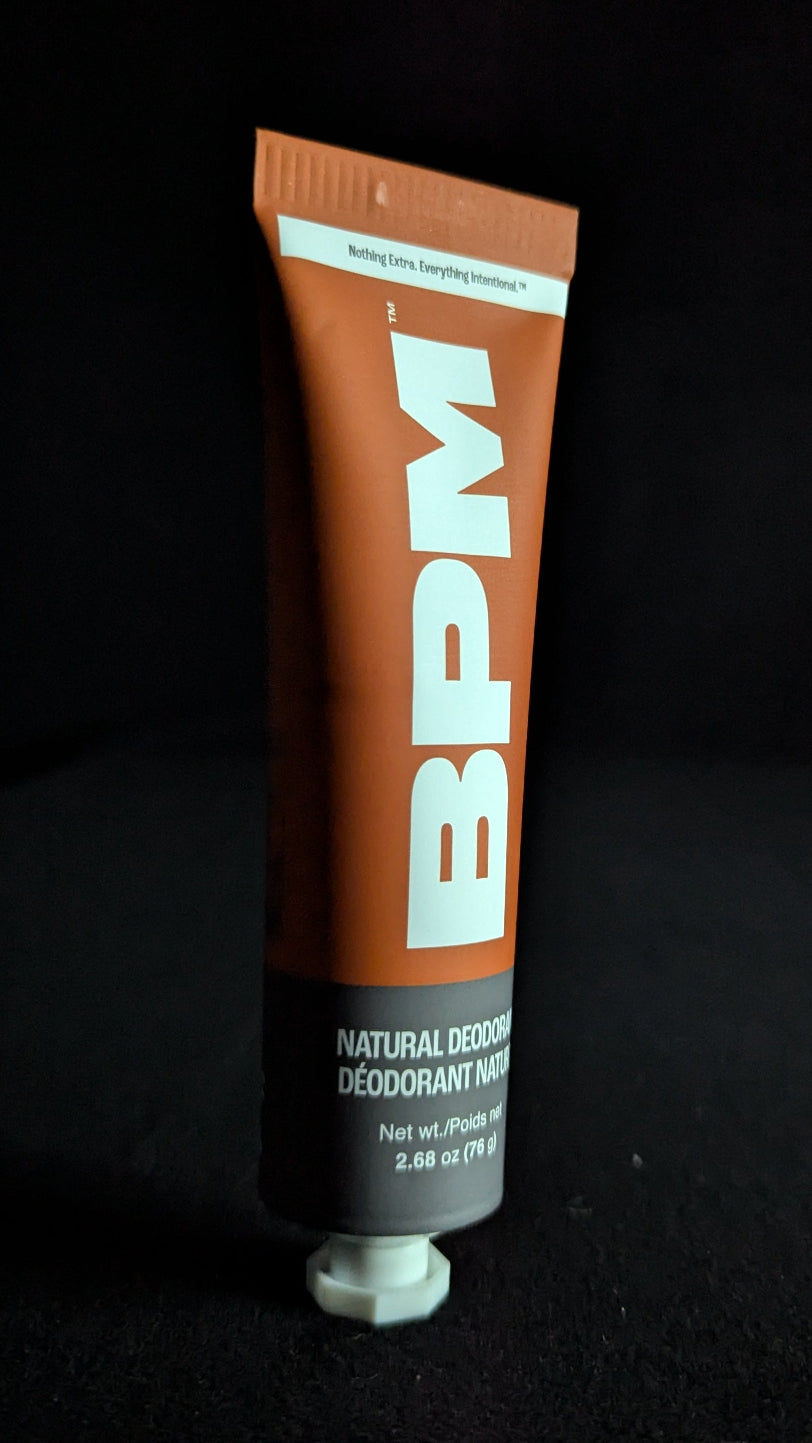 BPM deodorant tube on a black background